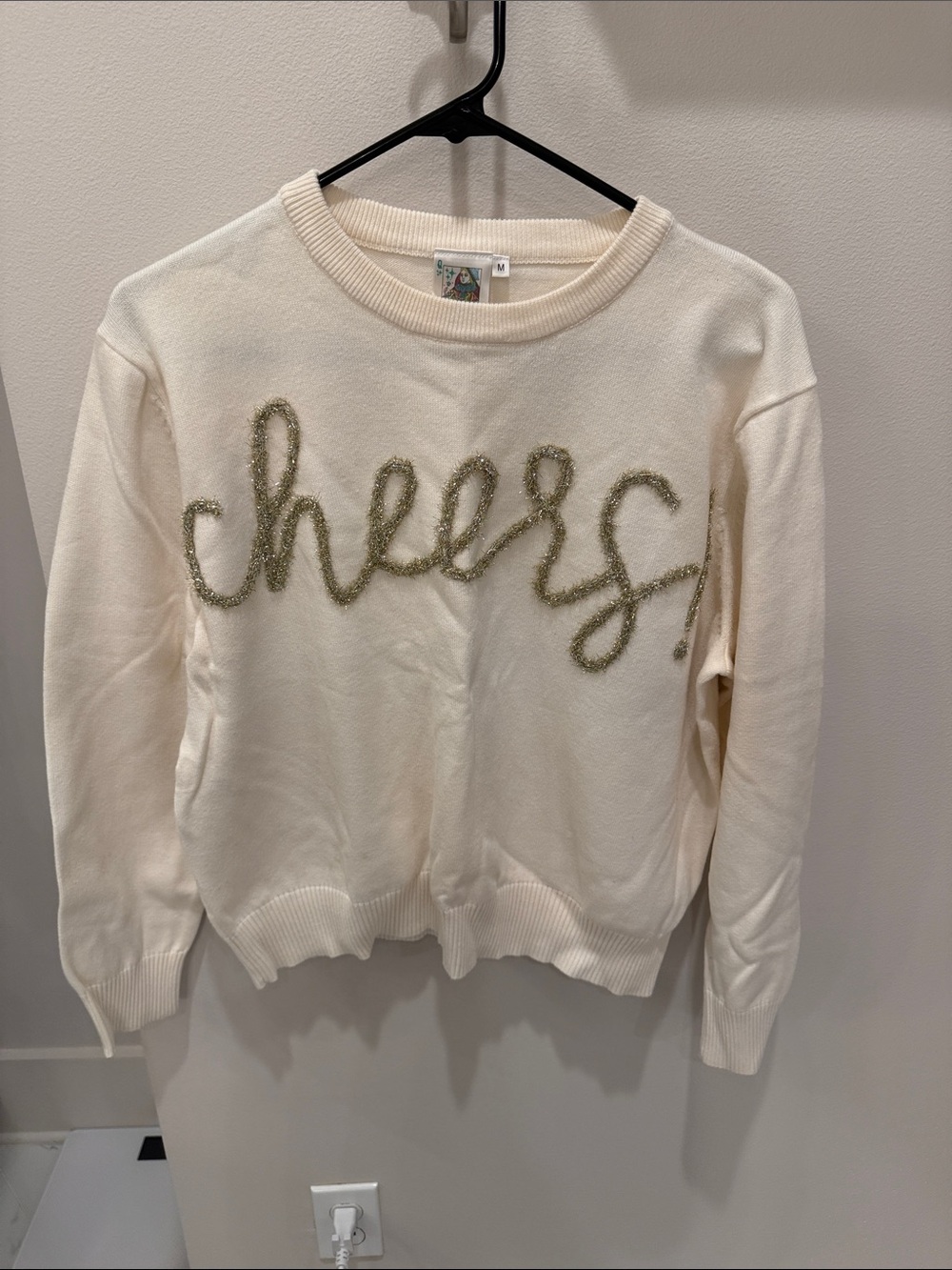 QUEEN OF SPARKLES Cream Crewneck Sweater with Gold 'cheers' Script